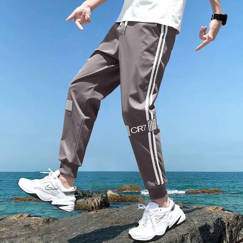 Casual pants men's Korean version of loose casual trend rod strips fashion small feet young people nine pants - Viva Vista Store